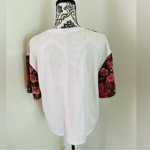 Elegant White Top with Floral Sleeves